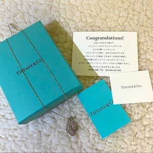 tiffany & co lotus achievement necklace